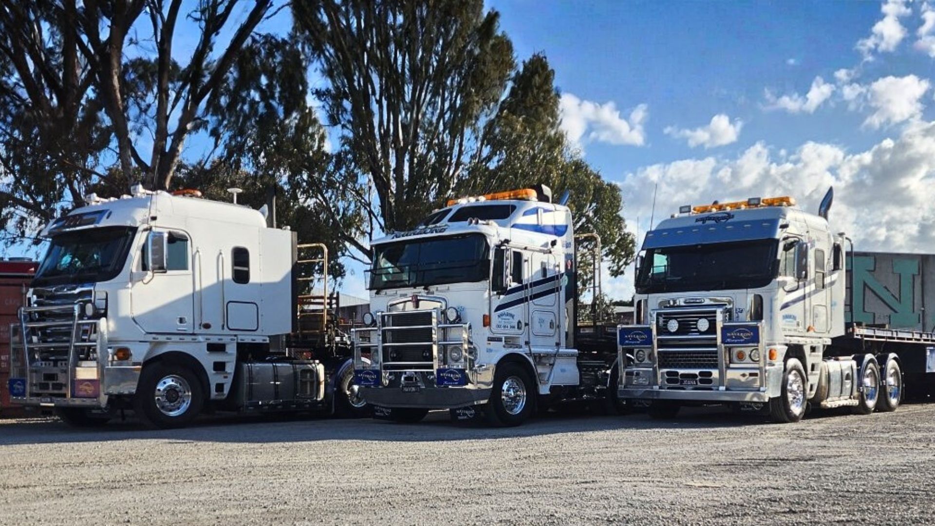 3 trucks lined up side by side